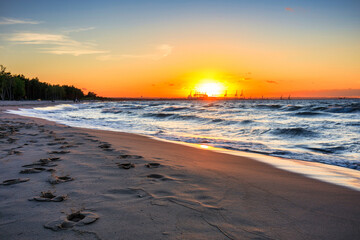 Sunset over the Baltic Sea beach in Gorki Zachodnie, Gdansk. Poland