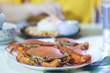 4 Cooked Mud Crabs on a White Plate