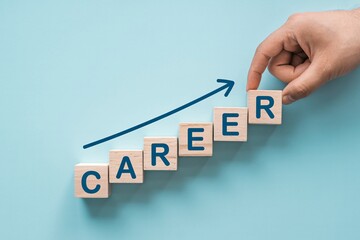 Hand placing wooden blocks spelling career with arrow showing professional growth progress.