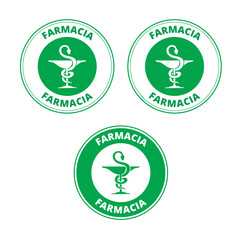 Green farmacia labels with the draw of a snake and a cup on a white background (trad. pharmacy)