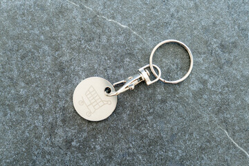 Shopping cart deposit chip, to replace a coin to release the shopping cart.