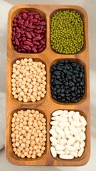 Wooden tray filled with various beans