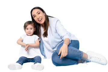 Picture of happy young woman mother with her little girl child daughter sitting isolated over transparent background. Motherhood.