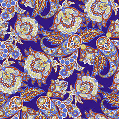 Paisley seamless vector pattern with fantastic flowers and leaves. Bohemian textile print inspired by batik. Vintage style