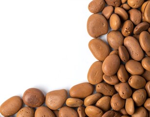 A border of smooth, light brown stones against a white background