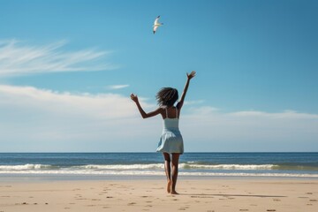 South African girl playing summer beach tranquility.