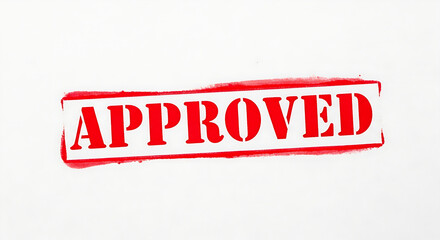 A red approved stamp on a white background with a red border
