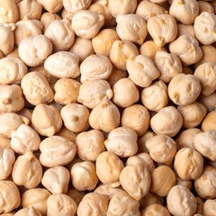 Close-up view of many light beige chickpeas densely packed together.