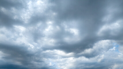 Cloudy sky ready for a storm. The clouds are dark and darken the sky. Ideal for backgrounds, textures and patterns.