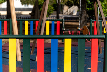 A Colorful Fence in a Childrens Playground The Concept of Childhood