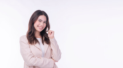 Fototapeta premium Cheerful excited successful business woman raise fist fight worker standing over isolated white background. Success young asian mixed race girl holding raise fist smiling expression positive on white.