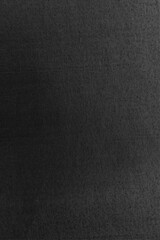 macro texture of black ink on paper. Detailed scanned paper surface with rough fiber structure.