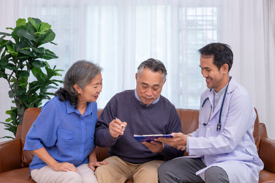health care worker asking a senior patient signing informed consent before getting medical procedure,test or examination