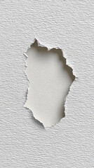 Mysterious closeup of torn hole with ripped edge in textured white paper. abstract background provides an empty space for revealing secret concept or idea