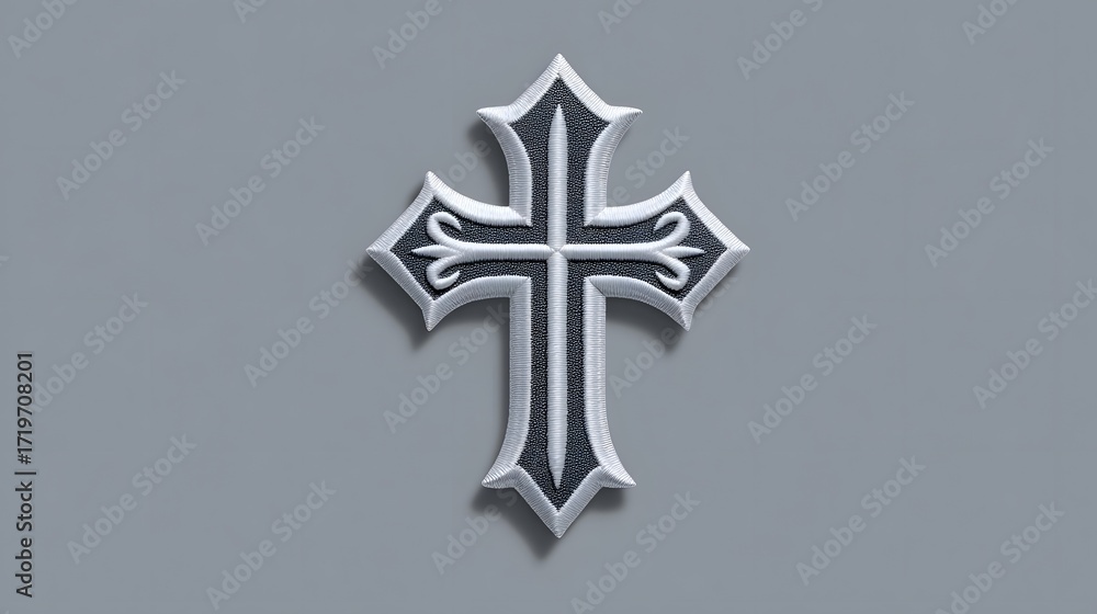 Poster stylized, ornate silver cross design with intricate patterns and details displayed against a minimal