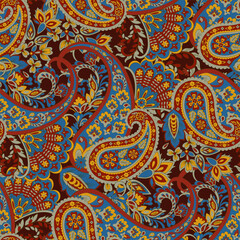 Paisley vector seamless design flowers and leaves in a batik-inspired style. Vintage fabric backdrop
