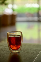 Close-up of the hot black tea. Cup of hot black tea. Food and beverage concept. Hot drink. Drink background. 