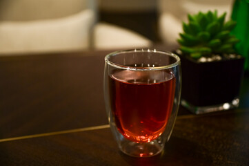 Close-up of the hot black tea. Cup of hot black tea. Food and beverage concept. Hot drink. Drink background. 
