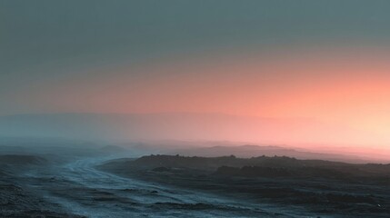 Fototapeta premium A surreal desolate landscape with rugged rocky terrain, winding snow-covered path, misty mountains,