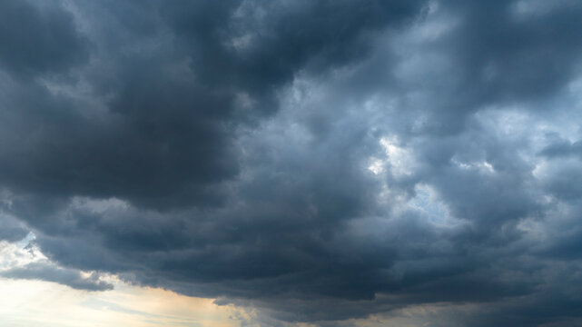Cloudy sky ready for a storm. The clouds are dark and darken the sky. Ideal for backgrounds, textures and patterns.