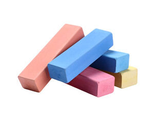 Obraz premium Colorful chalk pieces stacked together, showcasing a variety of vibrant hues and textures for creative projects.