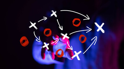 Neon hand shows a strategic game plan. Perfect for business, marketing, and strategy concepts.