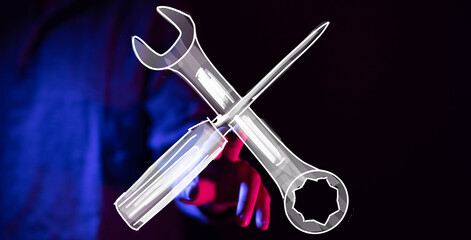 High-quality stock photo of a hand and crossed wrench and screwdriver. Perfect for repair, maintenance, technology, and problem-solving co