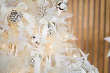 Beautiful Christmas tree in decorated living room. Festive interior
