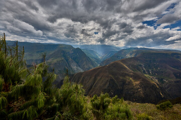 Mirador of Huanca Urco near Chachapoyas, the view stretches across dramatic canyons and a vast Andean landscape. A sweeping panorama where depth, silence, and grandeur merge, offering a glimpse into t