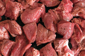 Raw sliced pork in sauce. Pieces of fresh marinated pork medallions. Freshly meat tenderloin, perfect for culinary, home cooked meals and flavor. Chopped Pork ham fillet with spice, herbs. 4K video