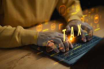 Tax concept with person using laptop for online filing, financial report, digital accounting, government payment, finance management, auditing, and modern technology for taxation services.