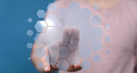 Abstract technology concept.  Woman interacts with a futuristic hexagonal interface.  Innovation, connection, digital.