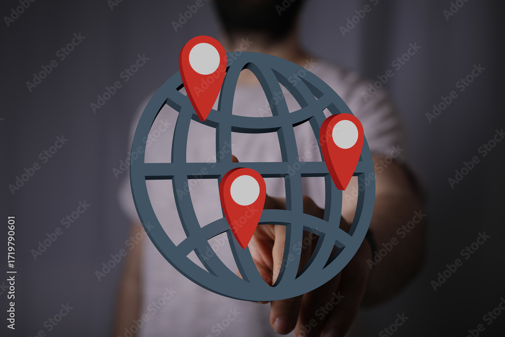 Poster man interacts with a digital globe showing multiple locations, representing global reach and connect