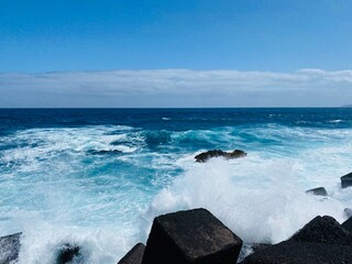 waves crashing on rocks