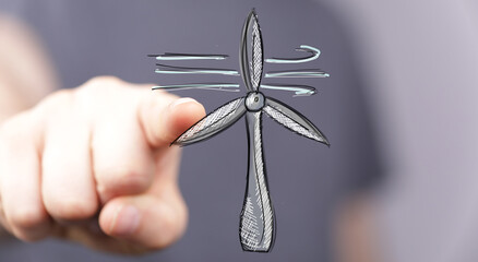 Sketch of wind turbine with hand pointing.  Clean energy, renewable energy, sustainability concept.
