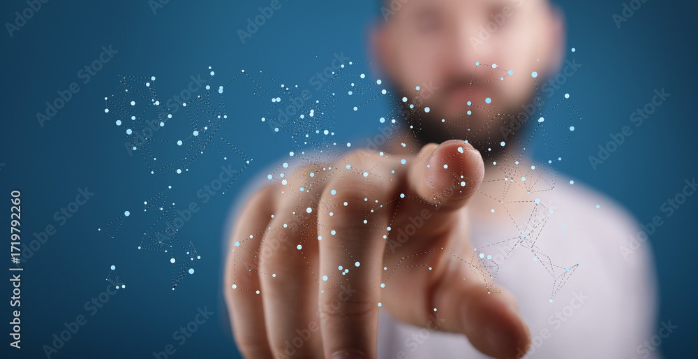 Poster close-up of a man's finger interacting with a digital network, representing global connectivity and 