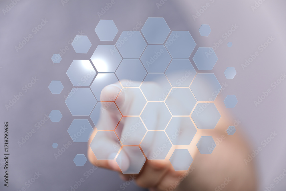 Poster abstract image of hand interacting with a digital hexagon network. perfect for technology, connectio