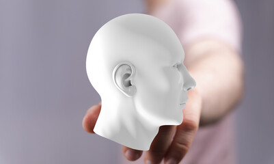 3D human head model held in hand.  AI, technology, mind, future, innovation, concept, digital,...