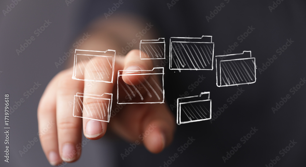 Poster image of a hand interacting with digital files and folders, representing data management, organizati