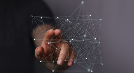 Abstract image of a hand interacting with a digital network, representing connection, technology, and innovation.