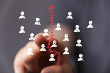 Stock photo depicting conflict, division, separation, team split, disagreement, crisis, problem,...