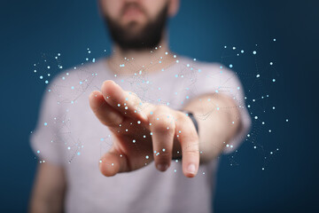 Hand reaching towards a digital network, representing connection, technology, and innovation.