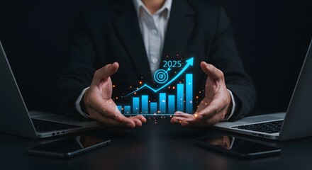 Business Growth Strategy: Hands Holding Futuristic Financial Graph with 2025 Target