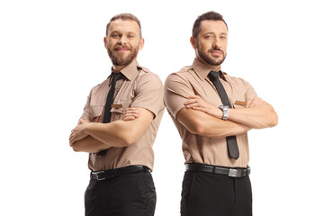 Security guards posing with crossed arms