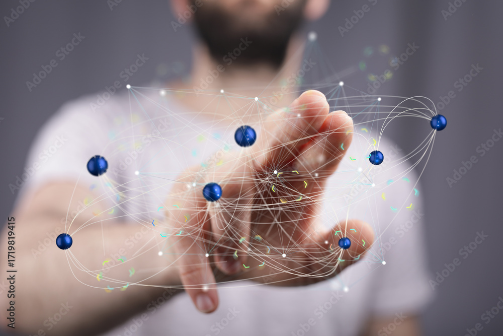 Poster abstract image of a man's hand interacting with a digital network, representing connectivity and tec