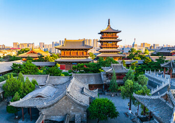Aerial photography of Huayan Temple in Datong, Shanxi, China on a sunny summer day with fiery clouds