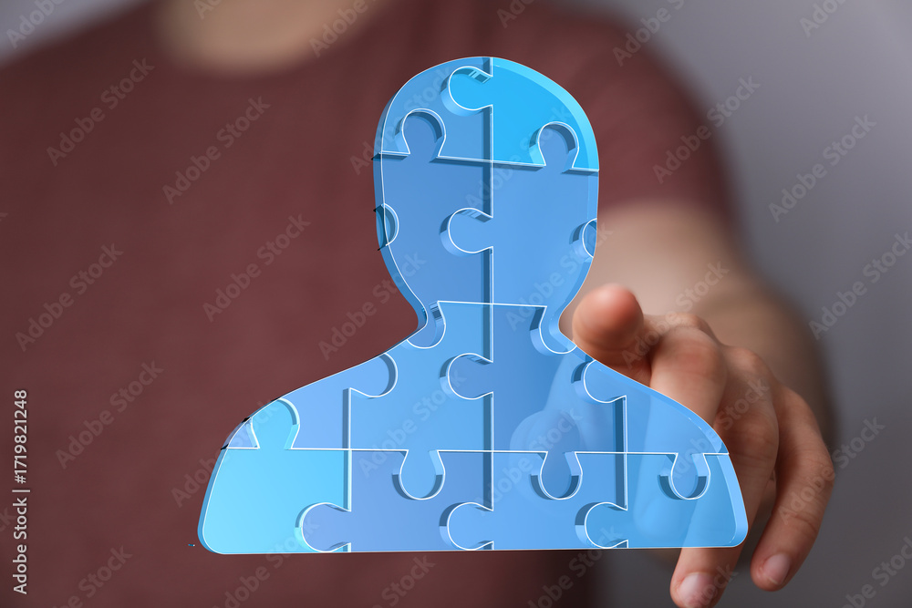 Poster abstract image of a person made of puzzle pieces. concepts: teamwork, collaboration, problem-solving