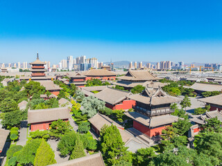 Fototapeta premium Aerial photography of Huayan Temple in Datong, Shanxi, China on a sunny summer day with fiery clouds