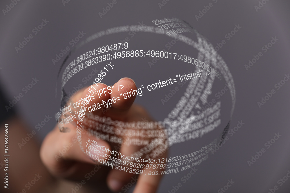 Poster close-up of a hand interacting with a holographic display showing ipfs code and data.