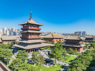 Aerial photography of Huayan Temple in Datong, Shanxi, China on a sunny summer day with fiery clouds